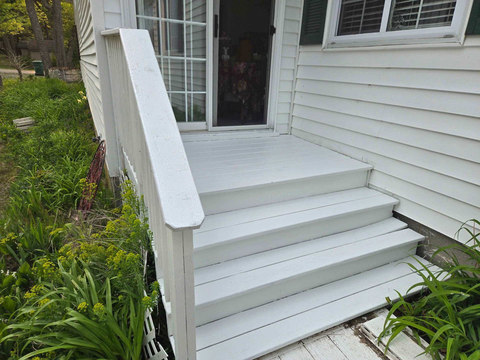 Freshly painted exterior steps and deck — quality work by Sunrise Side