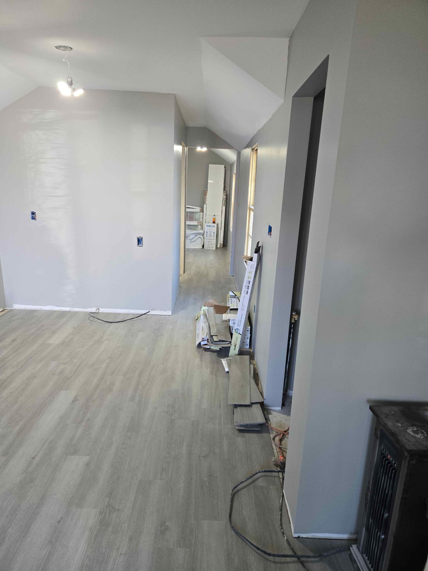 Interior painting and laminate flooring in progress